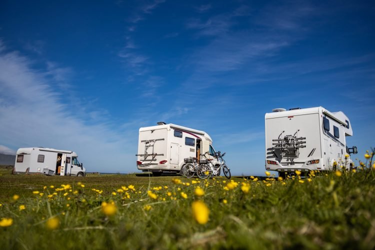 Family vacation travel RV, holiday trip in motorhome, Caravan car Vacation. Beautiful Nature Norway natural landscape.